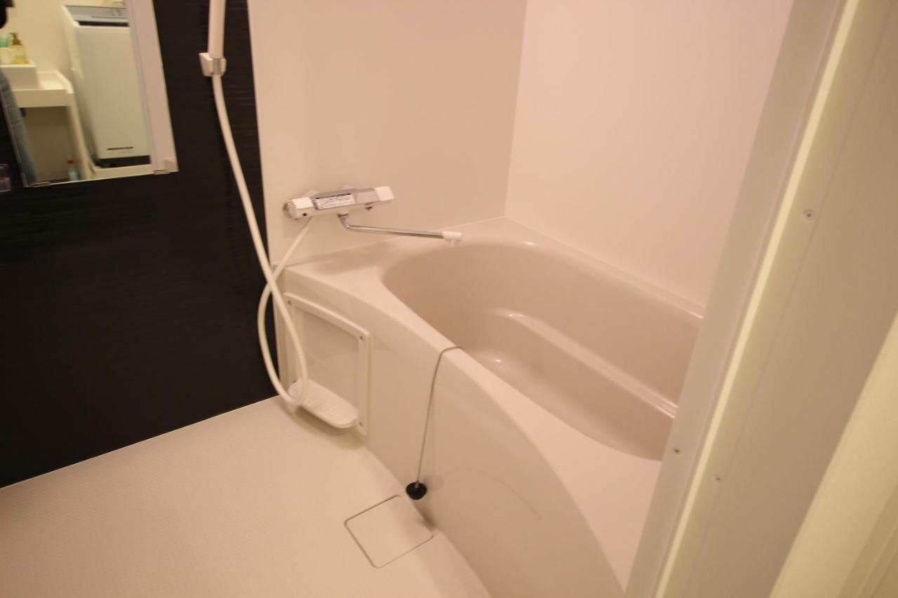 Namba West Saika Apartment Osaka Bagian luar foto